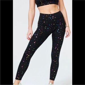 Terez black with rainbow foil mini star print leggings.